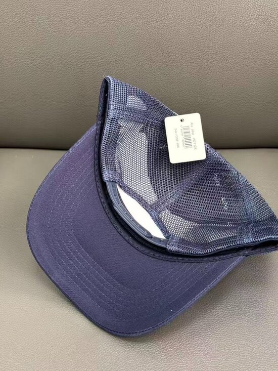 ALO Yoga District Trucker Hat Alo Yoga District Trucker Cap - Dune Grass | Editorialist main image 4